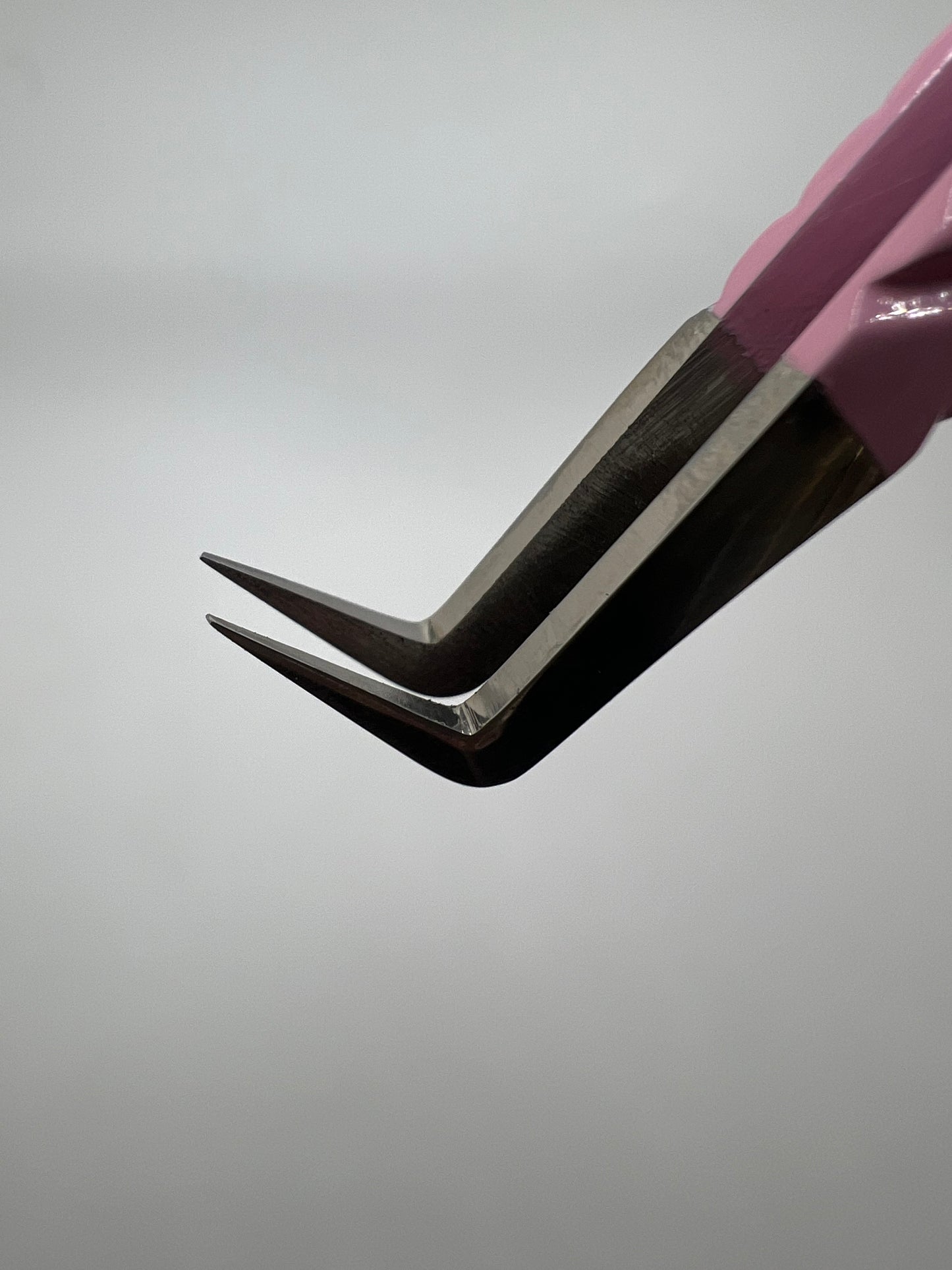 Baby pink volume boot tweezer