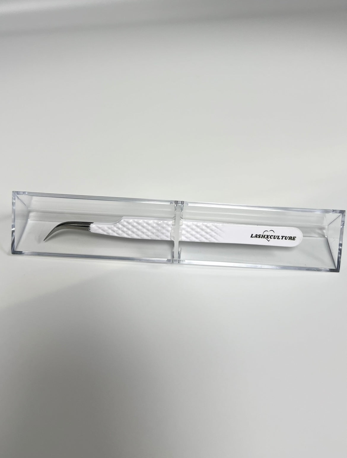 White curved isolation tweezer