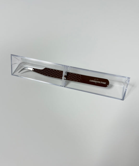 Brown curved isolation tweezer
