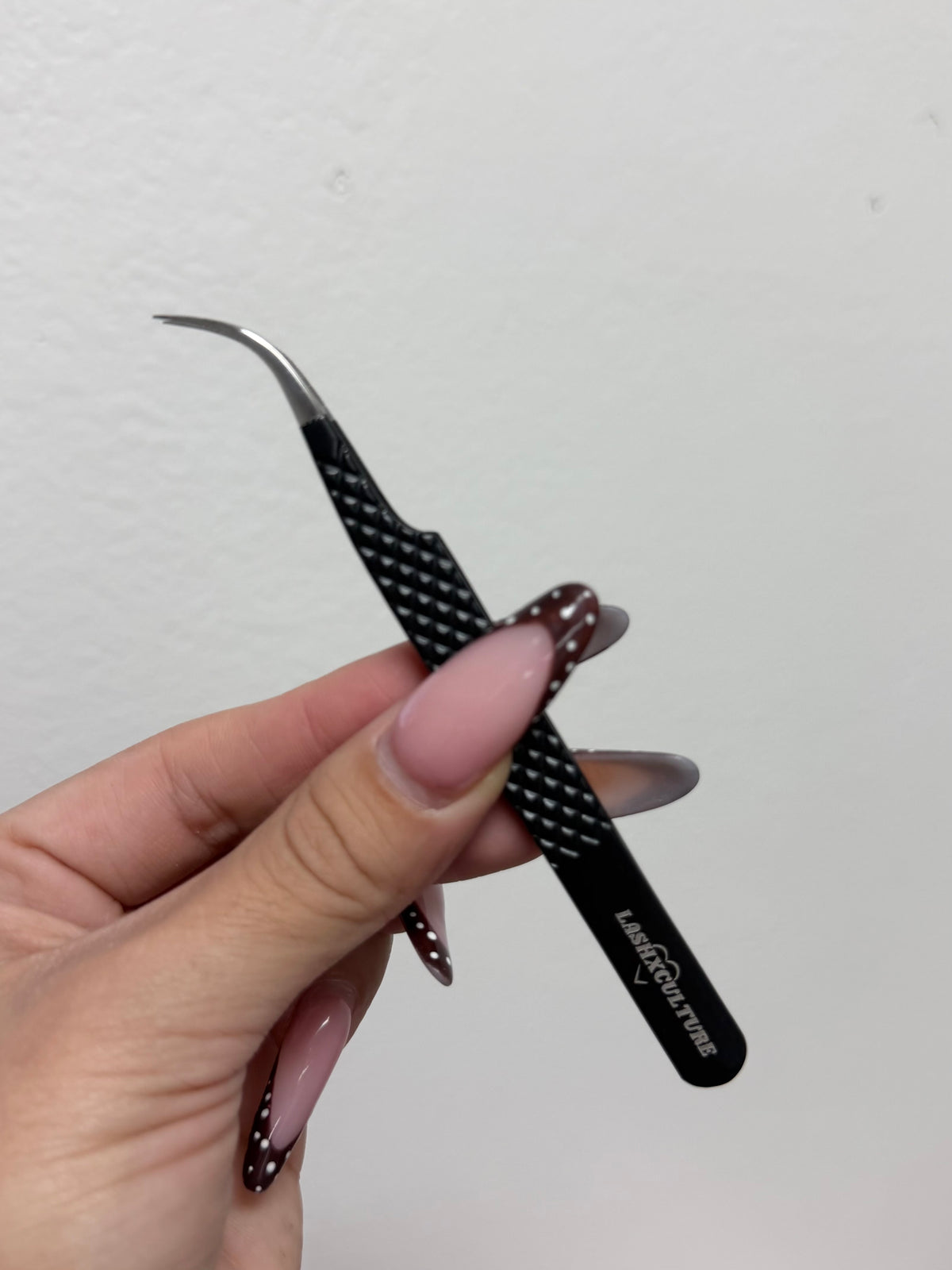 Black curved isolation tweezer